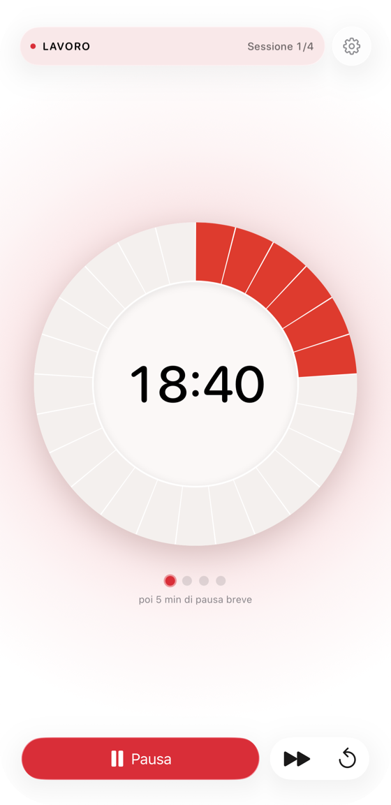 Il timer Pomodoro Tomatino su un iPhone: il quadrante in stile Time Timer riempie lo schermo e conta alla rovescia una sessione, con il ciclo e i controlli sotto